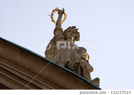 Angel on the portal of St. Catherine church and Mausoleum of Ferdinand II, Graz, Austria Angel on the portal of St. Catherine church and Mausoleum of Ferdinand II, Graz, Austria 132257523
