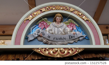 Angel with Gloria in excelsis Deo Banner, Nativity Scene, altarpiece in the church of Saint Matthew in Stitar, Croatia 132257526
