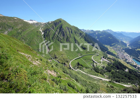 The St. Gotthard Pass, which has been built starting 1827, connects the two Swiss cantons Uri and Ticino, Switzerland The St. Gotthard Pass, which has been built starting 1827, connects the two Swiss cantons Uri and Ticino, Switzerland 132257533