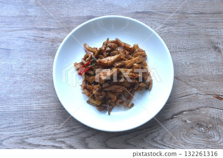 spicy stir fried slice bamboo shoot and tofu with curry vegetarian food on plate spicy stir fried slice bamboo shoot and tofu with curry vegetarian food on plate 132261316
