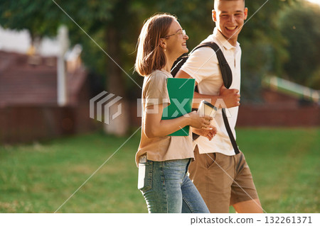Two students are together outdoors Two students are together outdoors 132261371