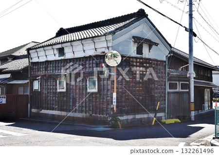 A historic storehouse on a street corner near Kameyama Station 132261496