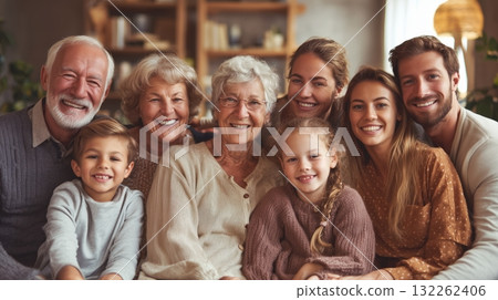 Photorealistic image of a multigenerational family with grandparents, parents, and children sitting together in a cozy living room, warm light, joyful expressions, generative ai illustration. 132262406