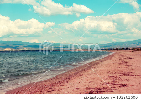 Seascape with beautiful cloudy sky. Tropic sea shore. Deserted beach. Marine landscape with ocean and blue sky 132262600