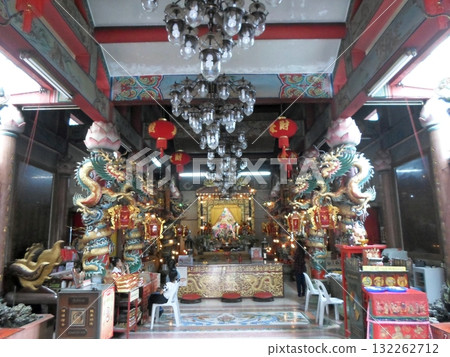 Ornate Temple Interior with Chandeliers, Dragon Statues, and Red Lanterns Ornate Temple Interior with Chandeliers, Dragon Statues, and Red Lanterns 132262712