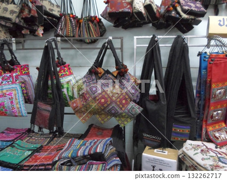 Market Stall Displaying Colorful Handmade Bags with Intricate Patterns Market Stall Displaying Colorful Handmade Bags with Intricate Patterns 132262717