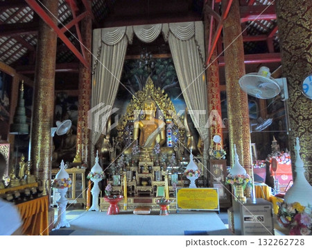 Temple Interior with a Golden Buddha Statue and Ornate Decorations Temple Interior with a Golden Buddha Statue and Ornate Decorations 132262728