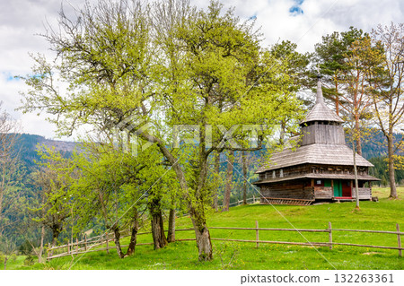 kuzhbeyi, ukraine - 12 may 2019: old wooden church on a hill in abandoned village of transcarpathia region, mizhhirya district. historic lemko architecture heritage 132263361