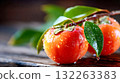 Close-up of fresh ripe persimmons with honey drizzle and mint leaves, symbolizing natural sweetness and organic freshness 132263383