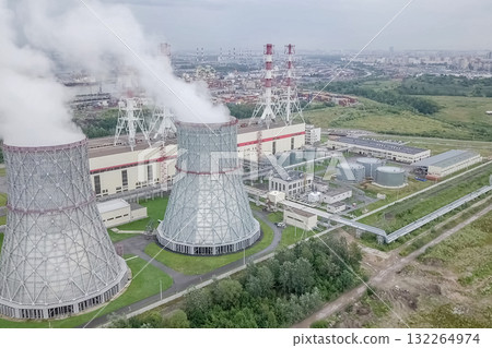 Soaring steam towers of nuclear power plant. 132264974