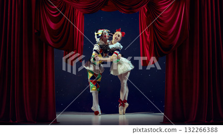 Emotive composition. Mime and ballerina embracing on stage for lighting reference. Emotive composition. Mime and ballerina embracing on stage for lighting reference. 132266388