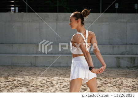 Weekend activity. Young skinny fitness woman is outdoors Weekend activity. Young skinny fitness woman is outdoors 132268023