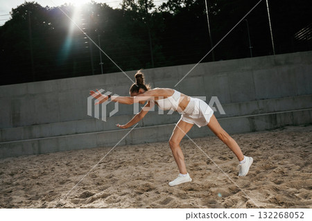 Outdoors, fitness conception. Young skinny woman is outdoors Outdoors, fitness conception. Young skinny woman is outdoors 132268052