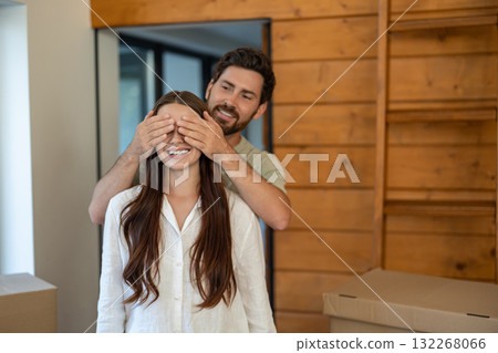 Cute couple having fun together at home and feeling joyful 132268066