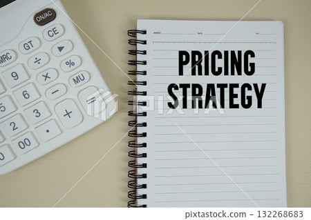 Pricing Strategy text with calculator phrase of business and financial concept 132268683