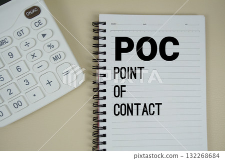 POC Abbreviations Of Point Of Contact text with calculator phrase of business and financial concept 132268684