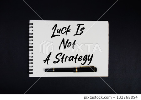 Spiral notepad with the motivational quotes "Luck Is Not A Strategy" 132268854