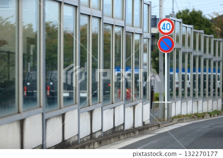 Soundproof wall installed on a public road 132270177