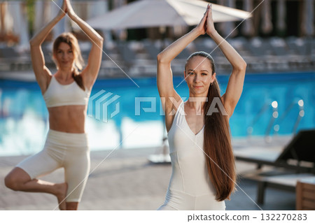 Two fitness women are together outdoors, conception of sport 132270283