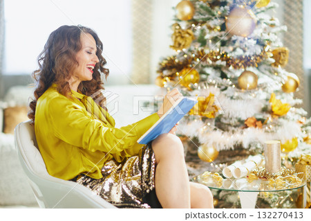 Festive Woman Reflects, Writing Holiday Plans 132270413