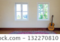 A room with a vintage classical guitar A room with a vintage classical guitar 132270810