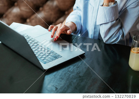 Beautiful woman with laptop is in the bar Beautiful woman with laptop is in the bar 132270819