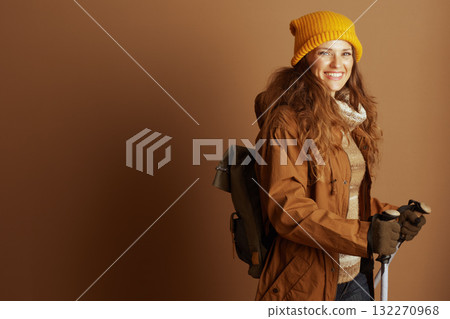 Outdoorswoman Posing with Gear for Winter Hike 132270968