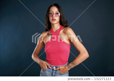 Beautiful young woman is against background 132271123
