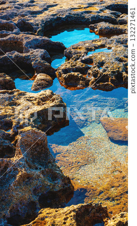Rocky seashore. Nature rocky background. Vertical banner Rocky seashore. Nature rocky background. Vertical banner 132271461