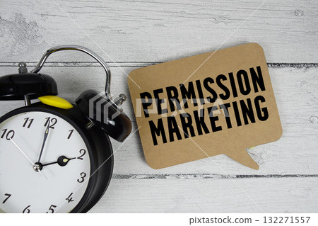 Permission Marketing text with alarm clock on wooden background 132271557