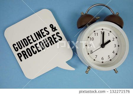 Guidelines And Procedures text with alarm clock on blue background 132271576