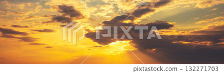 Colorful cloudy sky at sunset. Sky texture. Abstract nature background. Horizontal banner 132271703