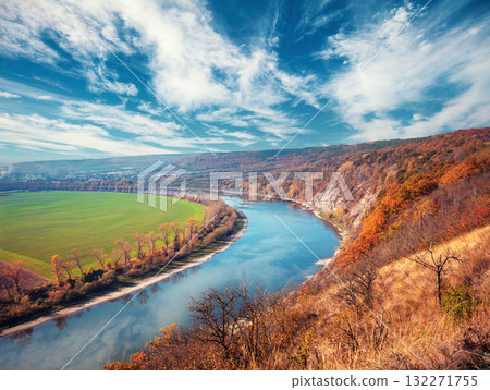 Rural landscape. River with a rocky bank in autumn. Beautiful nature Rural landscape. River with a rocky bank in autumn. Beautiful nature 132271755