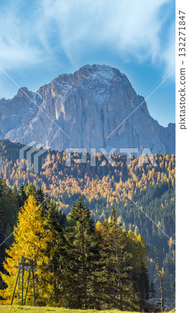 Autumn alpine Dolomites rocky mountain scene, Sudtirol, Italy. Peaceful view near Wolkenstein in Groden, Selva di Val Gardena. Autumn alpine Dolomites rocky mountain scene, Sudtirol, Italy. Peaceful view near Wolkenstein in Groden, Selva di Val Gardena. 132271847