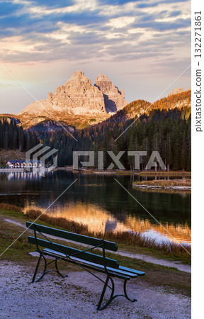 Bench near autumn evening Lake Misurina and Three Peaks of Lavaredo (Tre Cime di Lavaredo), Dolomites, Italy. Bench near autumn evening Lake Misurina and Three Peaks of Lavaredo (Tre Cime di Lavaredo), Dolomites, Italy. 132271861