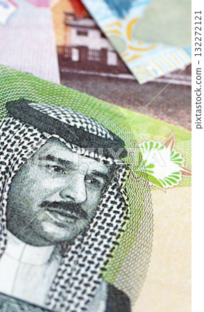 Bahraini dinar currency money bills. The current banknotes lies on table in big amount close up Bahraini dinar currency money bills. The current banknotes lies on table in big amount close up 132272121