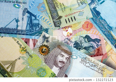 Bahraini dinar currency money bills. The current banknotes lies on table in big amount close up 132272123