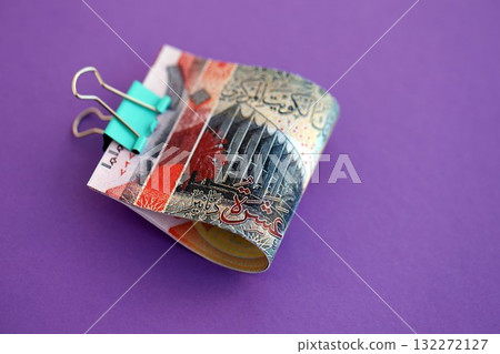 Kuwaiti dinar money bills in big amount on purple close up. Finance and banking concept 132272127