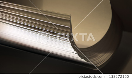 Curved pages of book in darkness 132272160