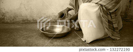 Man pour water into bowl 132272190