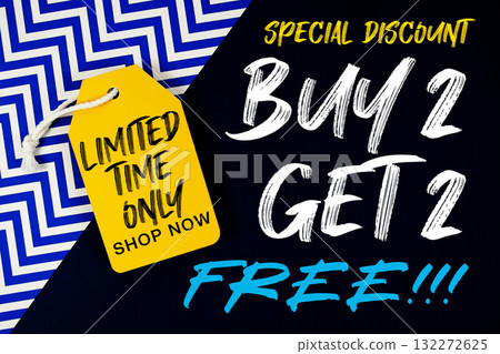 Buy 2 Get 2 Free!!! with Limited Time Offer text on price tag on dark navy blue and blue chevron background 132272625