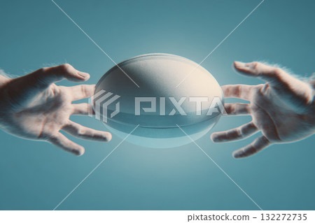 Hands passing rugby ball minimal modern surreal style blue background teamwork sport dynamic focus competition energy motion creative concept 132272735