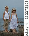 Cute sibling portrait. Blond little girl and boy holding each others hands outdoors 132273108