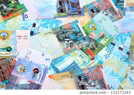 Kuwaiti dinar currency money bills. The current banknotes lies on table in big amount close up 132273263