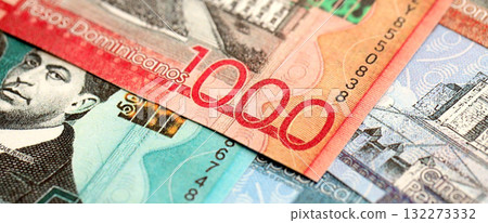 Dominican Republic Pesos currency money bills. DOP currency banknotes in big amount with different denomination close up 132273332