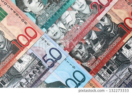 Dominican Republic Pesos currency money bills. DOP currency banknotes in big amount with different denomination close up 132273333
