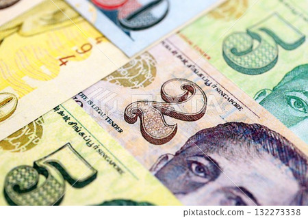 Singapore Dollar currency money bills. SGD currency banknotes in stack with different denomination close up 132273338