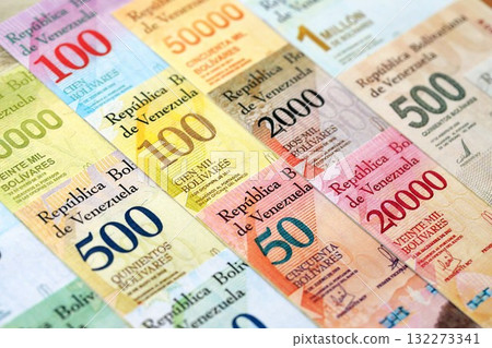 Venezuelan Bolivar currency money bills in big amount. Bunch of VED currency banknotes with different denomination close up Venezuelan Bolivar currency money bills in big amount. Bunch of VED currency banknotes with different denomination close up 132273341