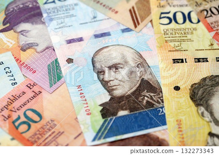 Venezuelan Bolivar currency money bills in bunch. VED currency banknotes with different denomination close up Venezuelan Bolivar currency money bills in bunch. VED currency banknotes with different denomination close up 132273343