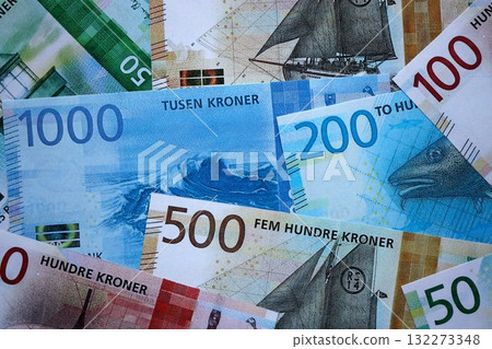 Norwegian Krone currency money bills. NOK currency banknotes in stack with different denomination close up Norwegian Krone currency money bills. NOK currency banknotes in stack with different denomination close up 132273348